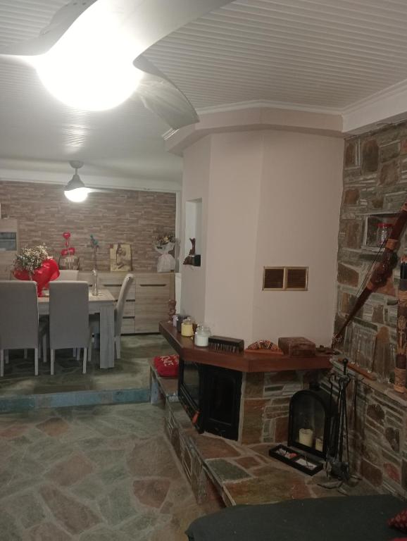 Living room with its stone fireplace